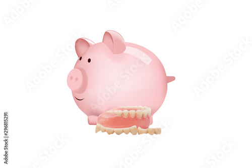 maialino rosa salvadanaio con protesi dentale dentiera photo