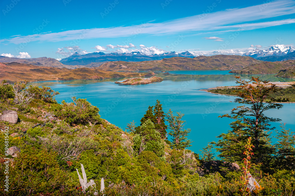 At the hiking trail in Torres del Paine National Park in golden Autumn, Patagonia, Chile