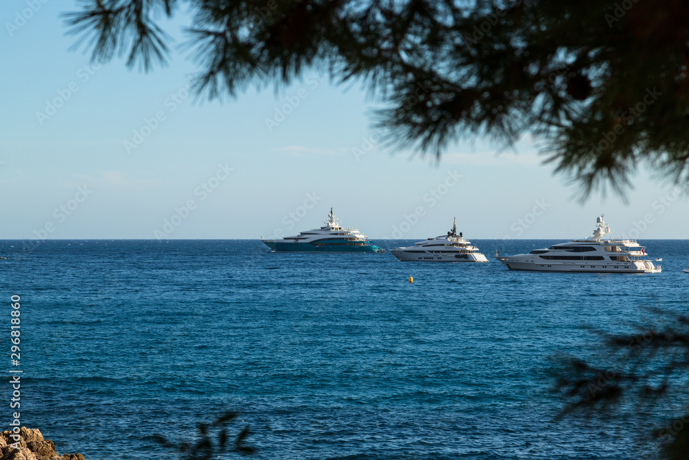 Obraz premium View of luxury yachts in the sea, Menton, France. Close-up.