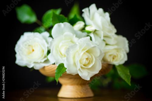 bouquet of beautiful white roses in a vase © Peredniankina