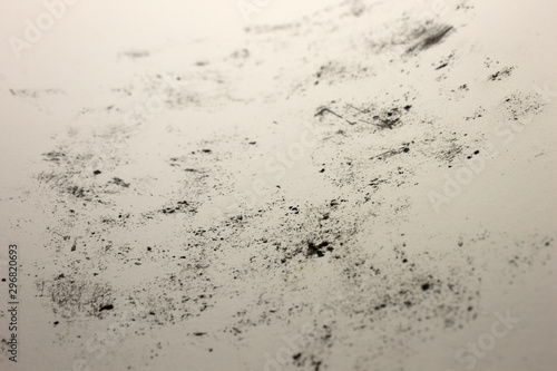 This is a photograph of a background created by applying Black marks onto a White paper using crayons