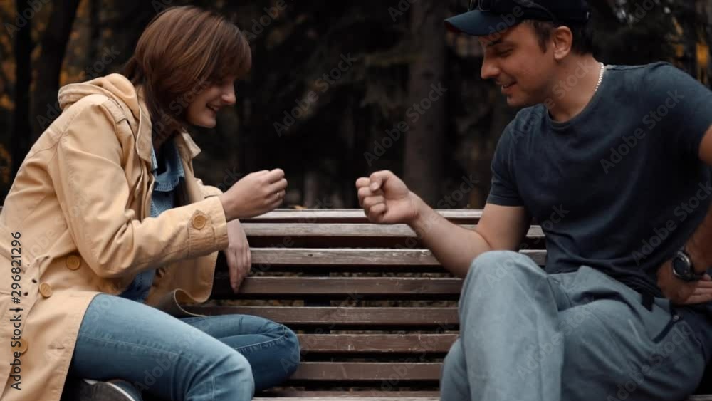 boy and girl play a game stone scissors paper boy and girl play a game stone scissors paper