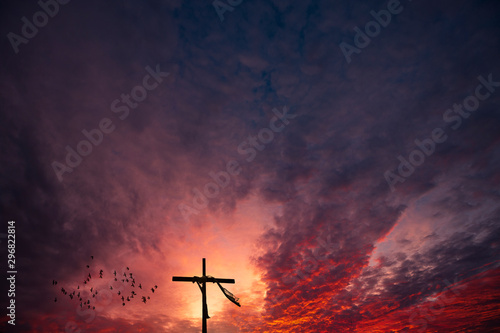 Fotografie, Obraz Cross and a dramatic epic sunrise