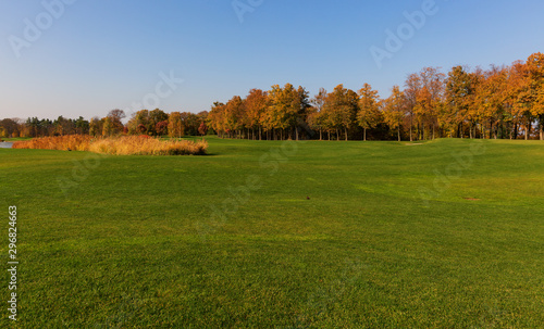 Autumn in the park and breathtaking view on the golf course.