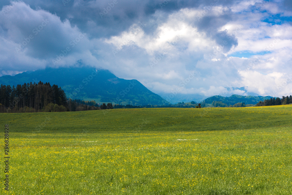 Panorama shot of Bavarian Alps with dramatic sky
