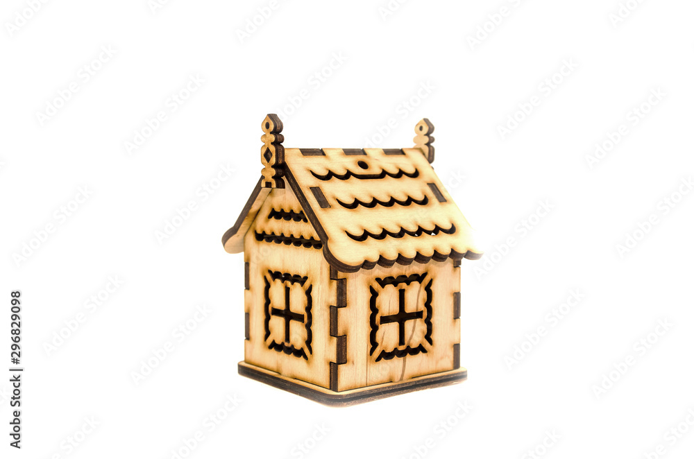 Wooden toy house  isolated on white