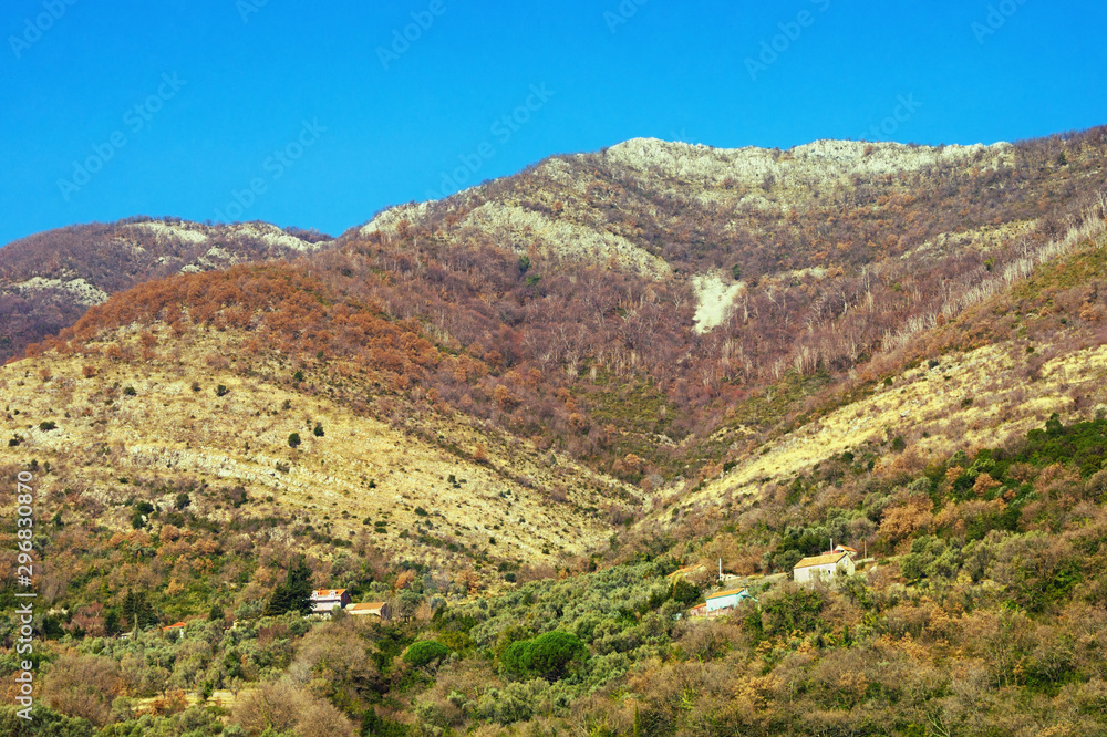 Scenic mountainside of Dinaric Alps in autumn colors. Montenegro, view of Mediterranean limestone mountain range Orjen near Kotor Bay