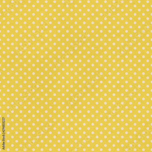 Polka retro background seamless yellow vintage texture in small dots.