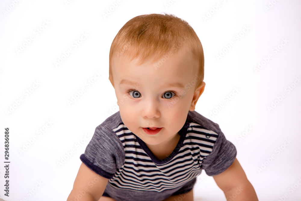 baby boy with blue eyes 7 months on white background isolate, space for text baby boy with blue eyes 7 months on white background isolate, space for text