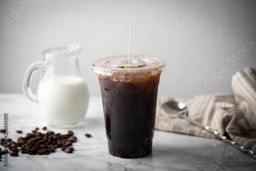 iced coffee in disposable plastic cup