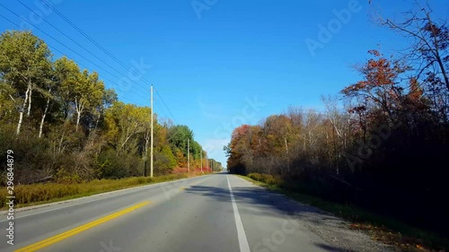 Pulling Over to Side of Road During the Day.  Driver Point of View Driving Rural Street Slowing Down to Roadside.