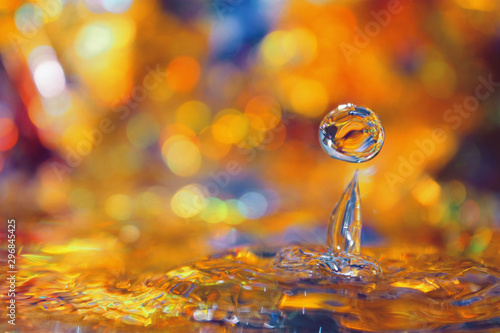 Selective focus of water surface with droplet