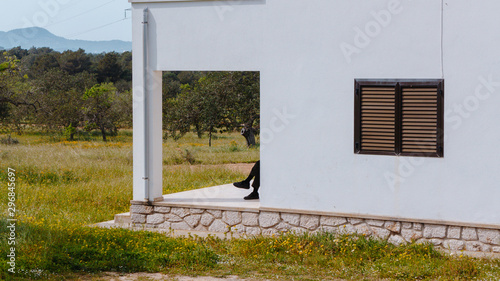 Man sitting in farm house