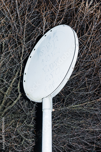 Overhead view of graffiti on painted sign signboard