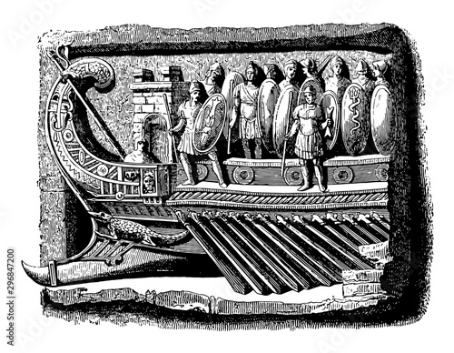 Sculpture is an ancient bas relief sculpture of a war galley vintage engraving.