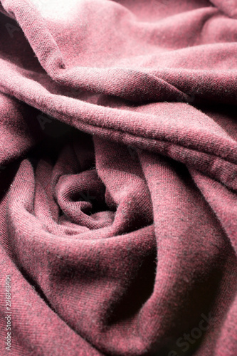 This is a photograph of textured Maroon Red fabric