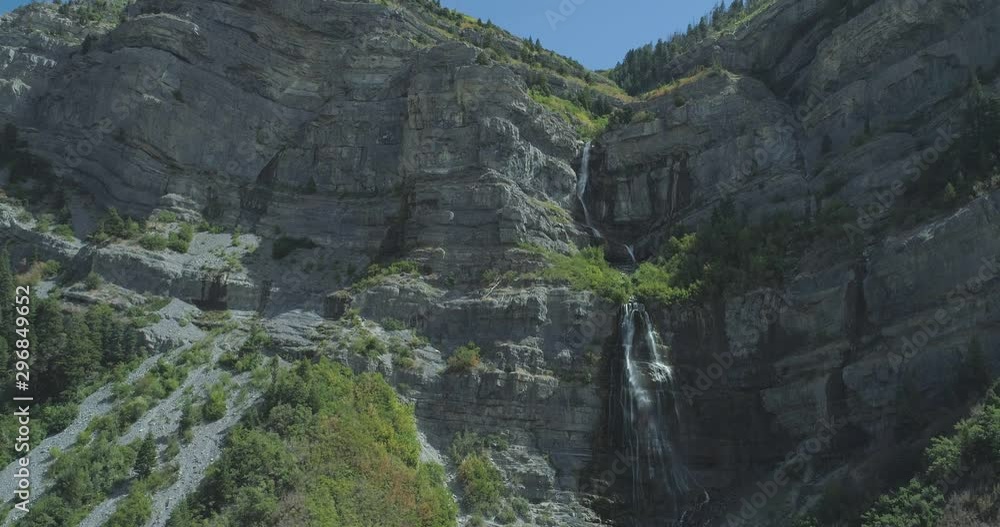 Waterfall from mountain cliff - Aerial Drone View in Utah Waterfall from mountain cliff - Aerial Drone View in Utah