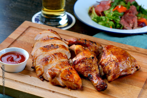grilled chicken on wooden pallet