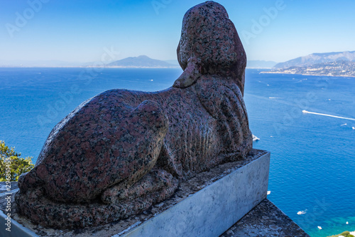 statue on rock photo