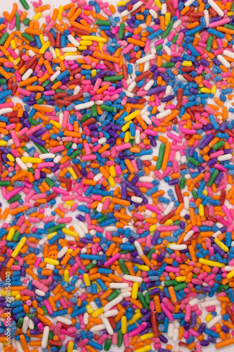 This is a photograph of colorful sprinkles isolated on a White background