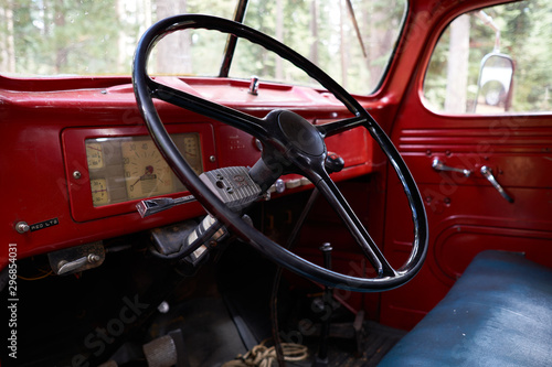 Close up of the cab of a vintage Fire truck that has been fully restored © ronm