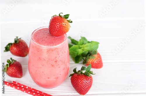 Strawberry smoothies colorful pink fruit juice beverage healthy the taste yummy In glass drink episode morning on white background.