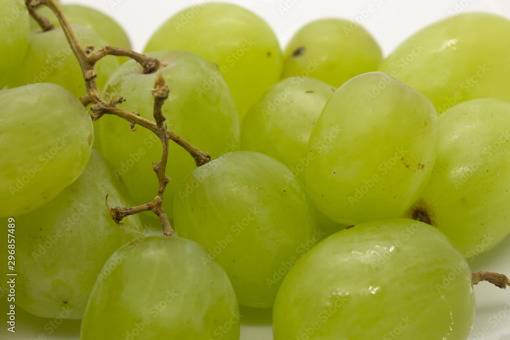 This is a photograph of Green Grapes isolated on a White background This is a photograph of Green Grapes isolated on a White background