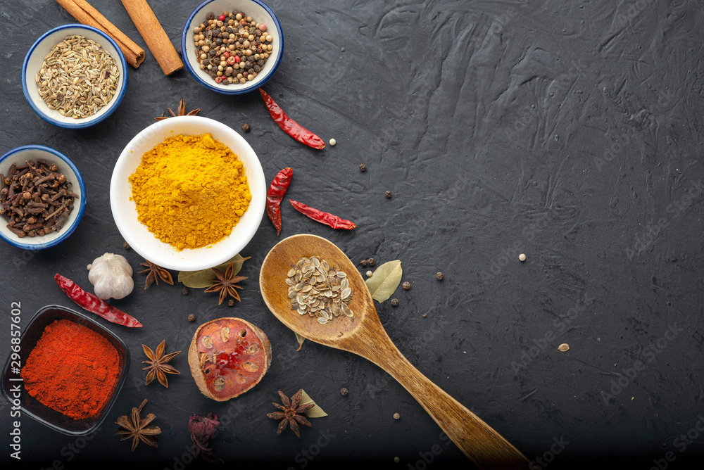 spices with ingredients on dark background. healthy or cooking concept, asian food spices with ingredients on dark background. healthy or cooking concept, asian food