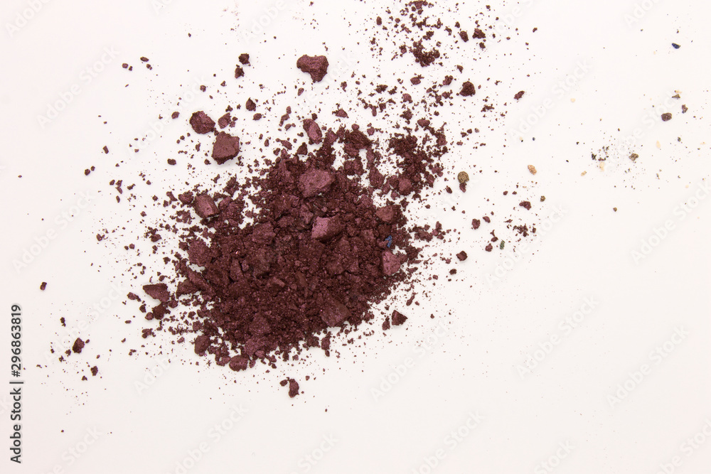 This is a photograph of a Berry Red powder Eyeshadow isolated on a White background