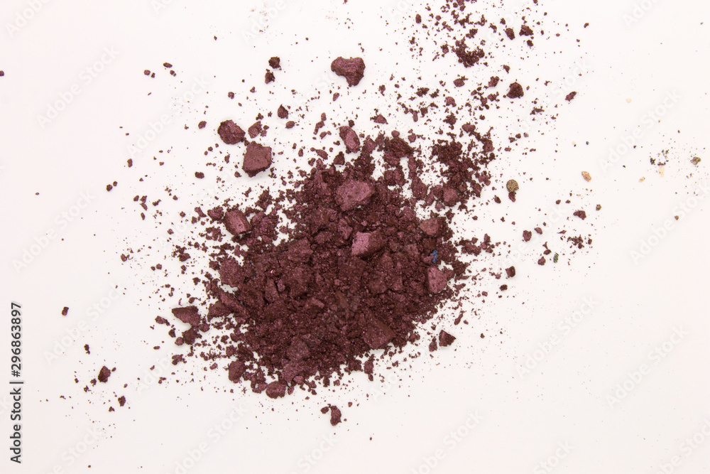 This is a photograph of a Berry Red powder Eyeshadow isolated on a White background