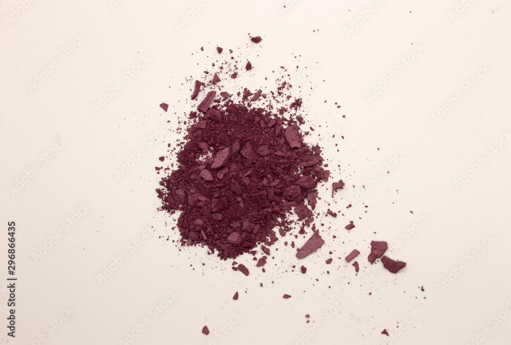 This is a photograph of Plum powder Blusher isolated on a White background