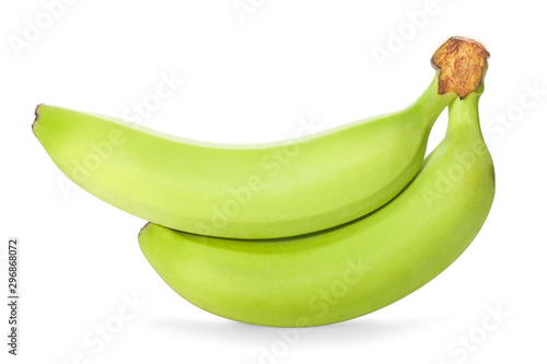 Fresh bananas with a green peel isolated on white background with shadow and clipping path.