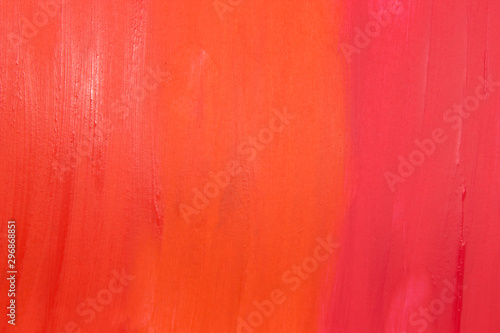 This is a photograph of three different shades of Orange and Red Lipstick swatches gradient background