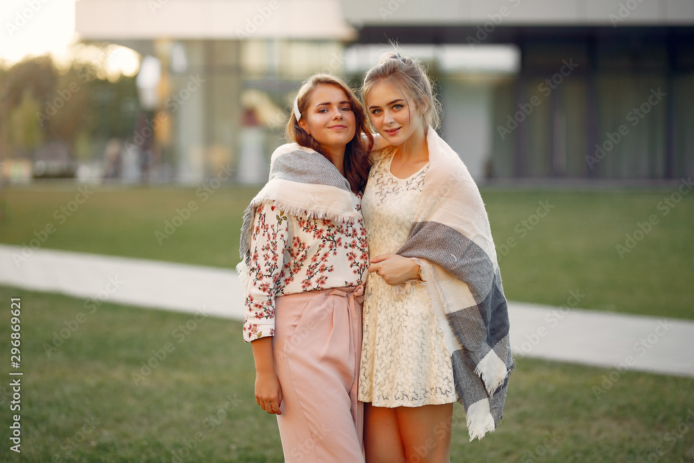 Girl in a blue jacket. Women in a summer park. Girl in a blue jacket. Women in a summer park.
