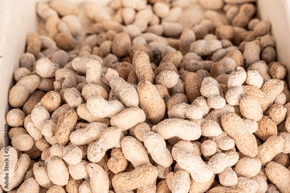 Roasted peanuts in shell, salted, in a street market Roasted peanuts in shell, salted, in a street market