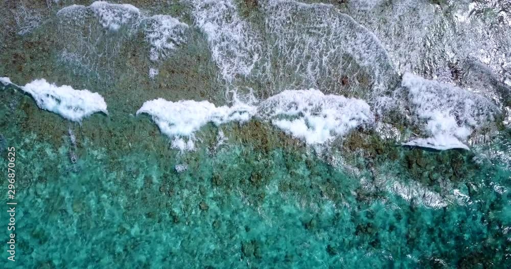Top view of waves break on tropical white sand beach in San Pedro Nolasco island Top view of waves break on tropical white sand beach in San Pedro Nolasco island