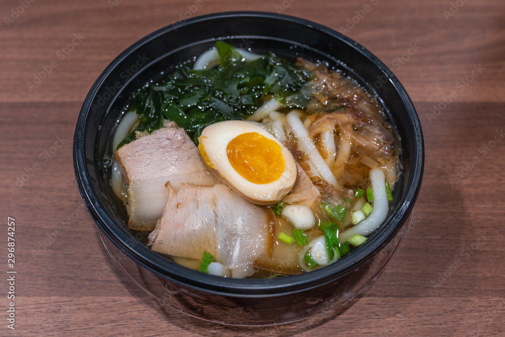 Bowl of delicious Japanese Udon noodles soup on table Bowl of delicious Japanese Udon noodles soup on table