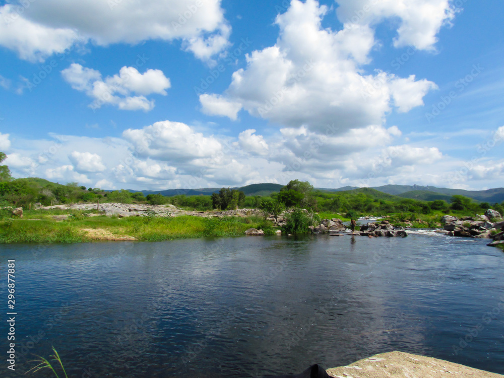 Açude Argemiro de Figueiredo em Itatuba Paraíba PB Brasil landscape with river and blue sky