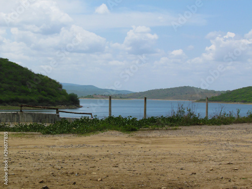 A  ude Argemiro de Figueiredo em Itatuba Para  ba PB Brasil landscape with river and blue sky