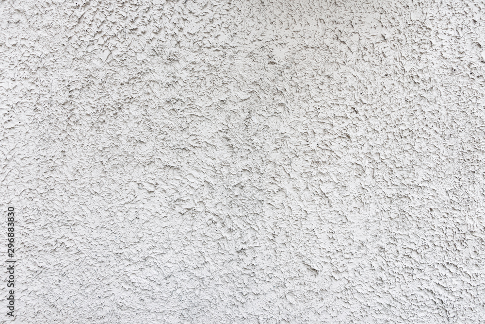 Rough white relief stucco wall texture background. blank for designers Rough white relief stucco wall texture background. blank for designers