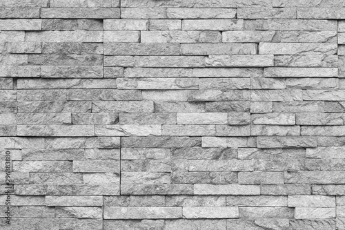 White natural facade stone decoration quartzite background texture. modern granite stone wall.