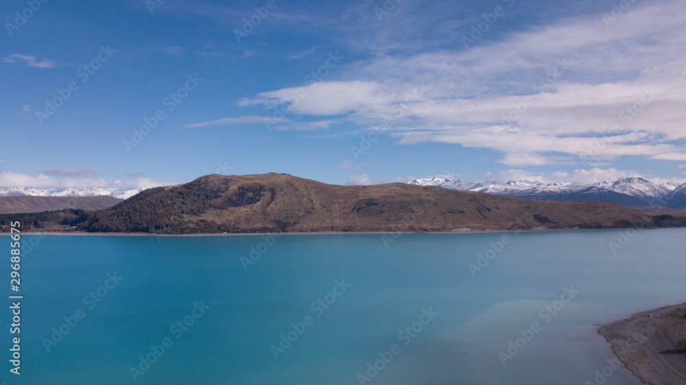 Lake Tekapo aerial view during sunny day. Lake Tekapo aerial view during sunny day.
