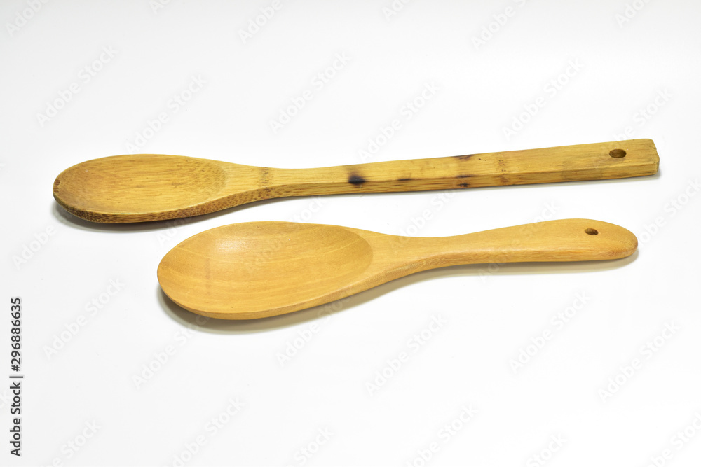 Wooden ladle, wooden spoon, put on a white background. Wooden ladle, wooden spoon, put on a white background.