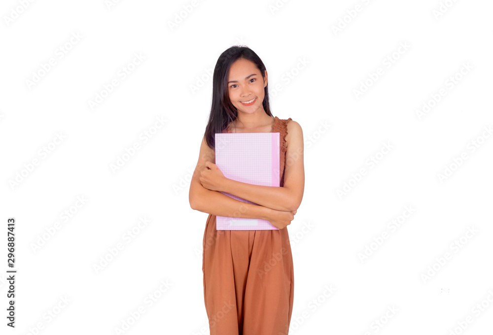 Asian girl in brown tank top hold books in her arms Asian girl in brown tank top hold books in her arms