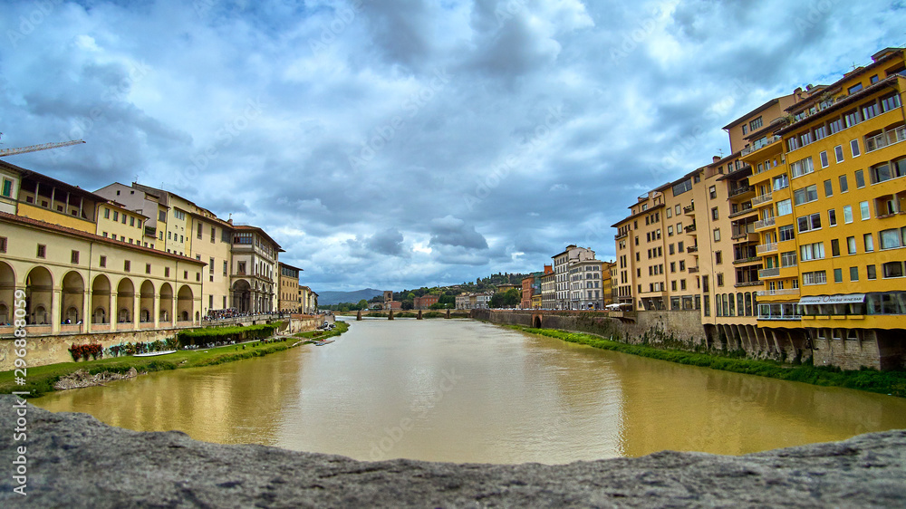 The bridge Ponte Alle Grazie over the Arno River. View from Ponte Vecchio. Florence, Italy.