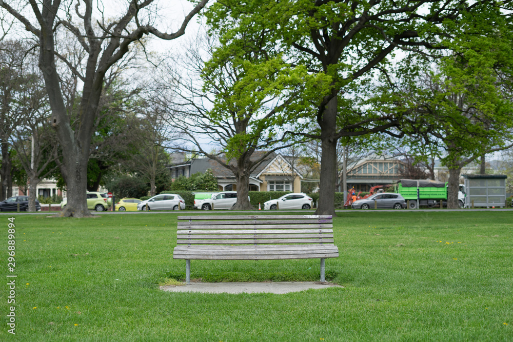 Empty wooden bench at the green park.Selective focus and copy space. Empty wooden bench at the green park.Selective focus and copy space.