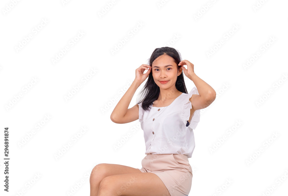 An asian woman sitting in white shirt isolated An asian woman sitting in white shirt isolated