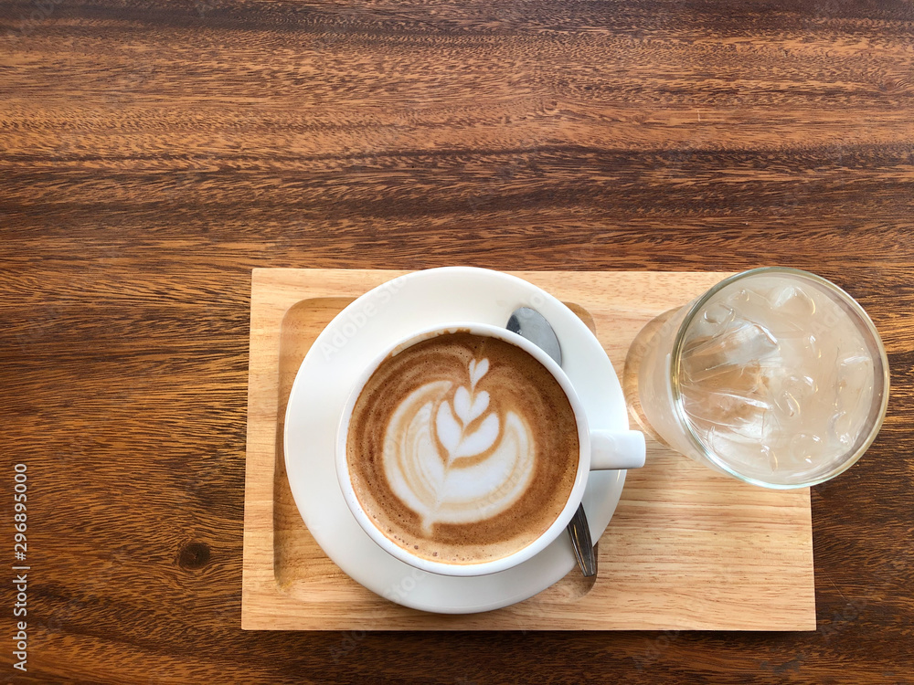 Hot coffee in a cup with milk foam Hot coffee in a cup with milk foam