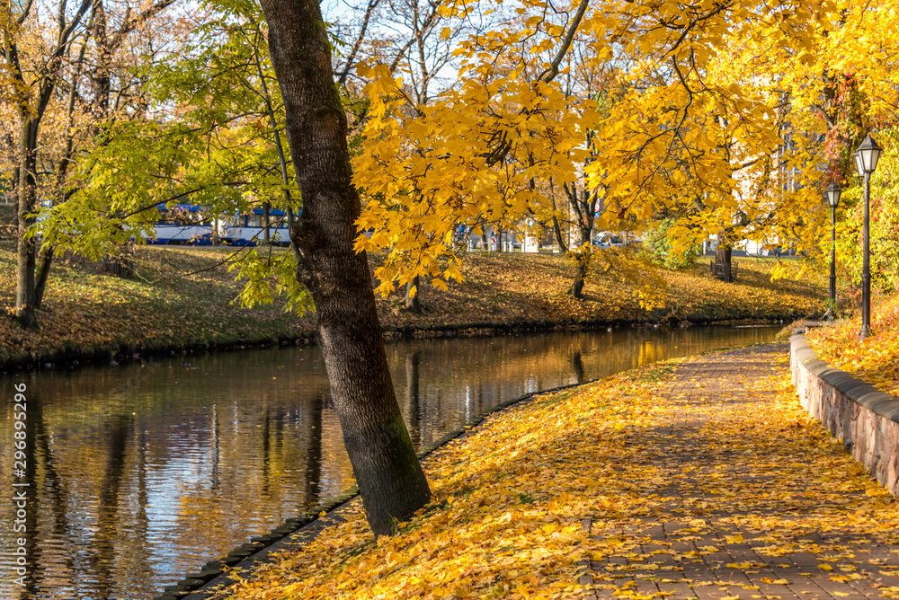 River Running through the Center of a City in Northern Europe in Autumn River Running through the Center of a City in Northern Europe in Autumn