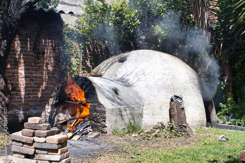 Latin man, Shaman, during shamanic, pre-Hispanic ritual, temazcal photo